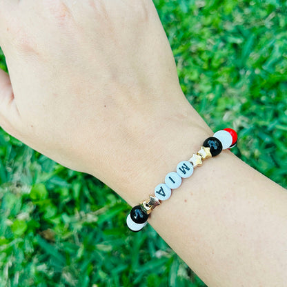 Pulsera Elástica Cuentas Mía Estrellas Doradas y Bronce