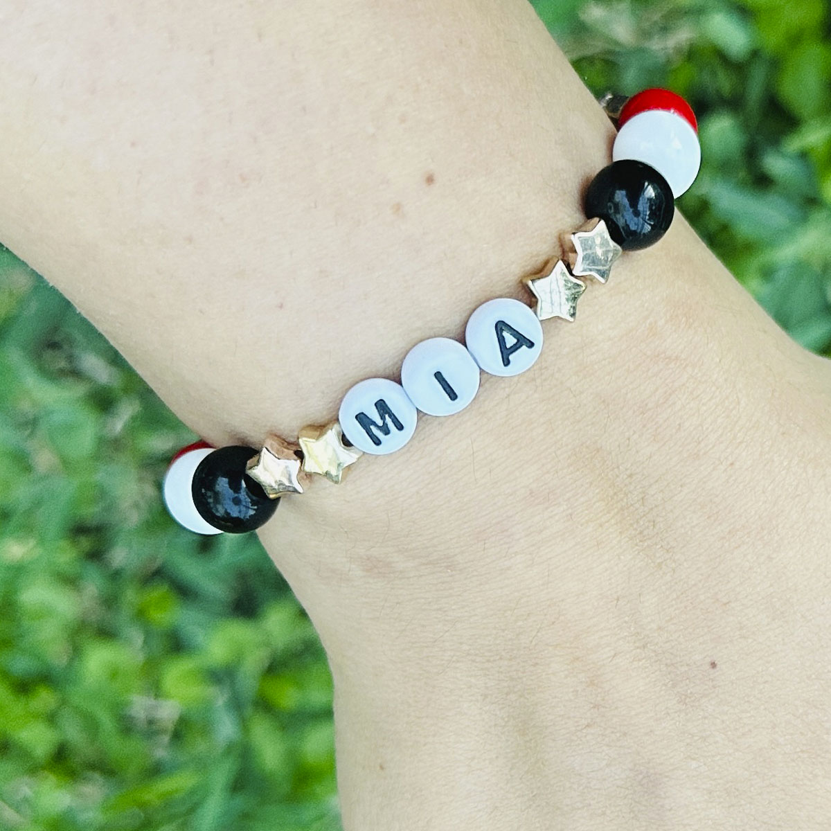 Pulsera Elástica Cuentas Mía Estrellas Doradas y Bronce